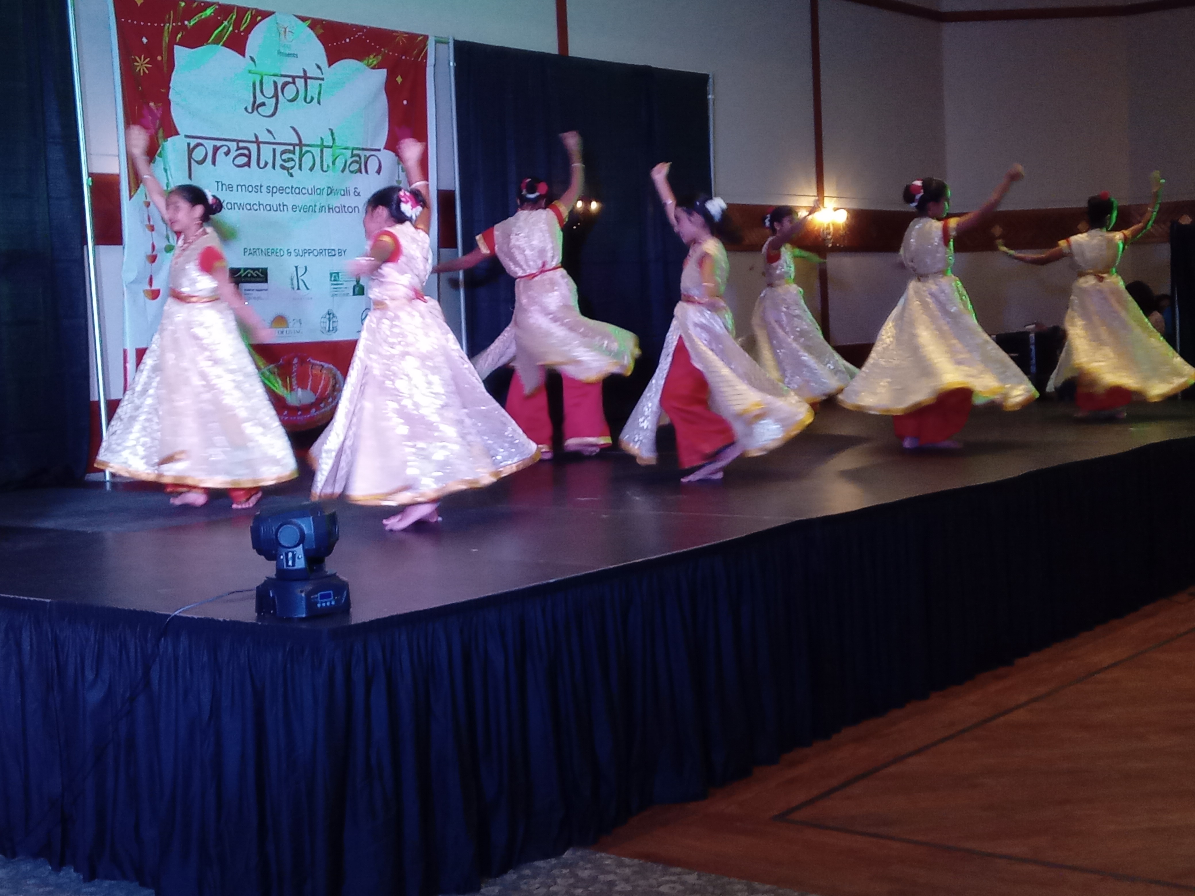 Cultural dance performance on an EventXcel stage