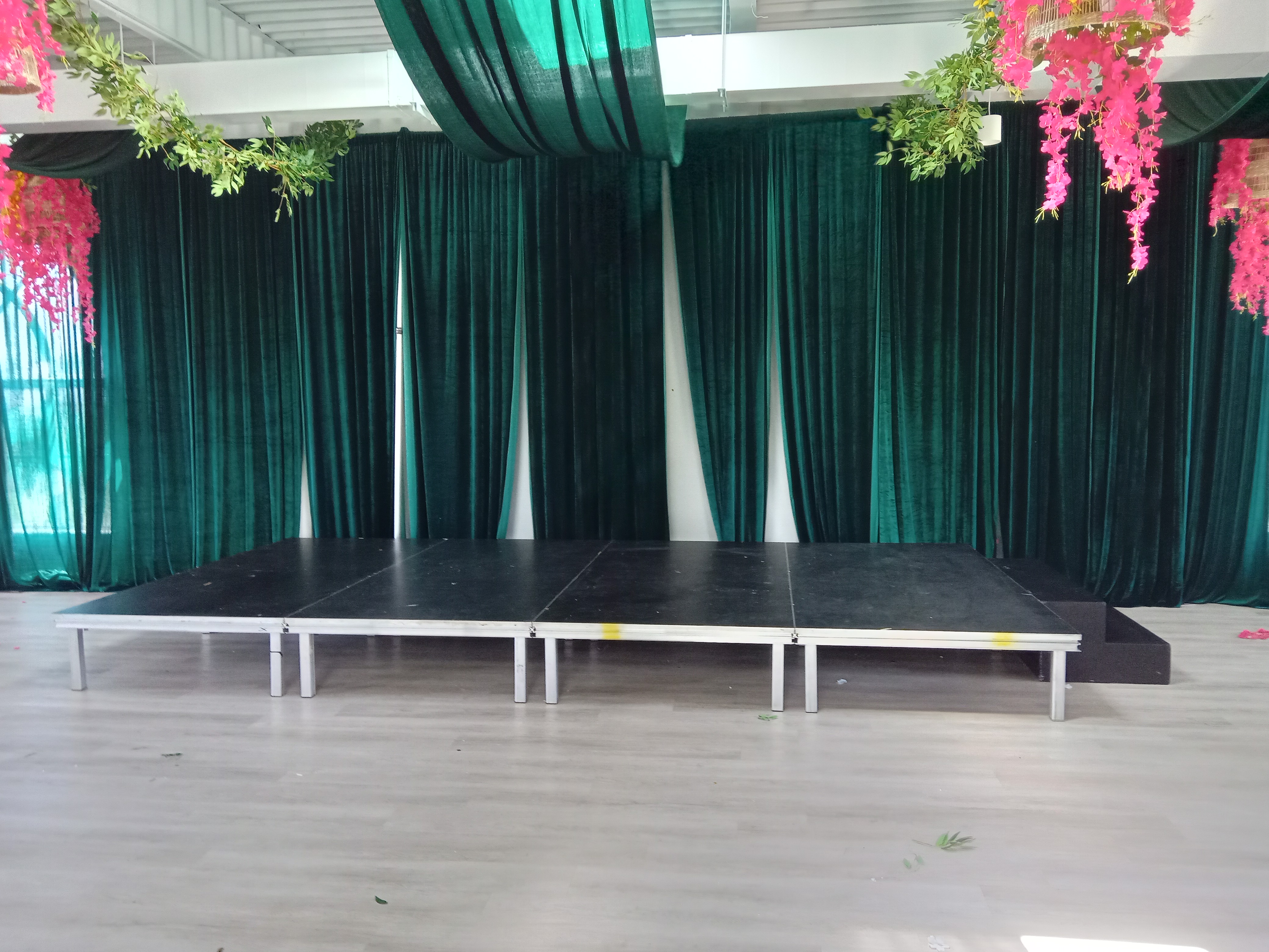 EventXcel stage with emerald draping
